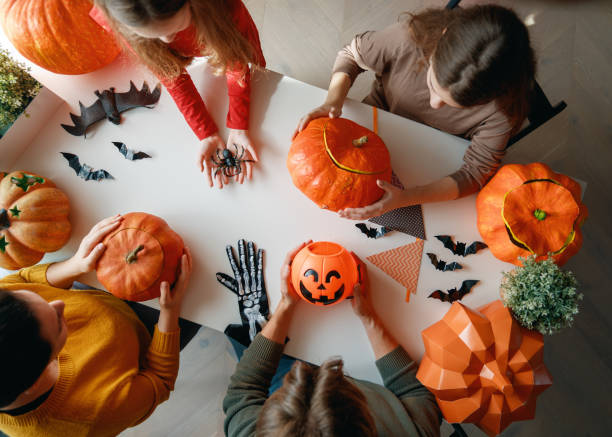 istock Happy family preparing for Halloween. 2173888133