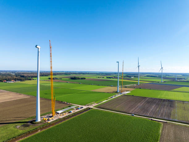 istock Wind turbine construction with huge cranes at a new wind park 2173888139