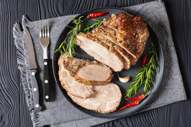 istock Roast Pork Neck sliced on a plate, top view 2173888457