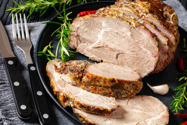 istock Roast Pork Neck sliced on a plate, top view 2173888632