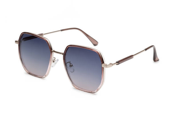 istock Stylish modern sunglasses with blue gradient lenses placed on a white surface showcase their sleek design 2173889199