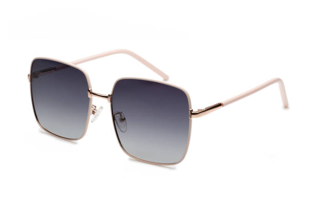 istock Stylish square-framed sunglasses with gradient lenses resting on a white surface 2173889203