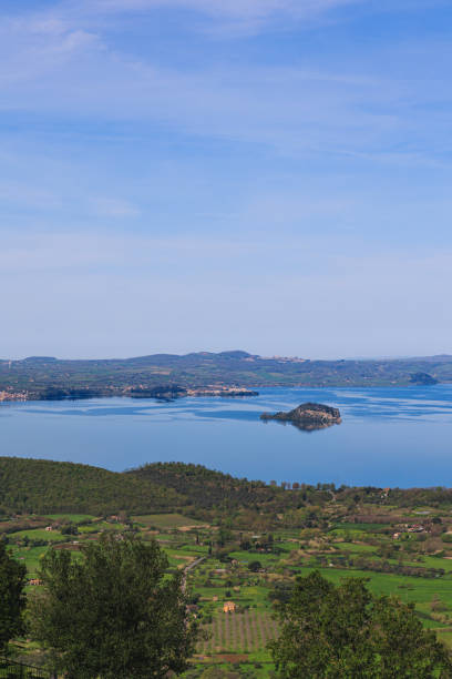 istock A panoramic view of the Lago di Bolsena (Bolsena lake) from a high vantage point under a dramatic cloudy blue sky 2173894213
