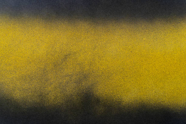 Yellow and black spray painted background