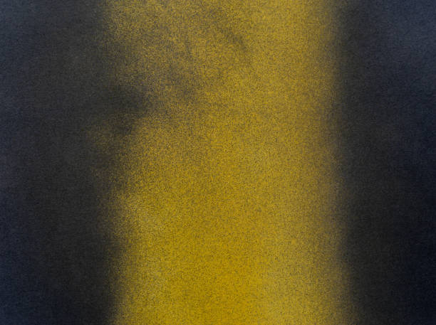 istock Yellow and black spray painted background 2173895809
