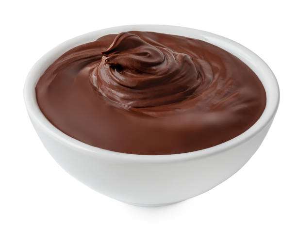 istock Chocolate hazelnut spread in a bowl isolated. Twisted Hazel nut cream on white background, melted chocolate jam. 2173897479
