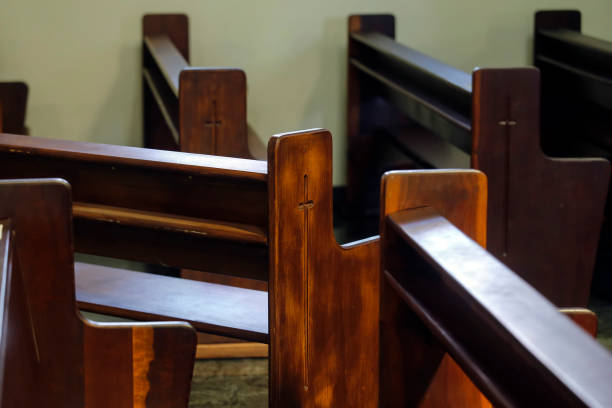 detail of wooden benches in a religious temple