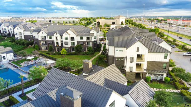 istock Swimming pool spa in new development apartment complex with metal roofing, siding near Interstate Highway I-35, fast growing area Pflugerville northeast of downtown Austin, Texas, housing market 2173904873
