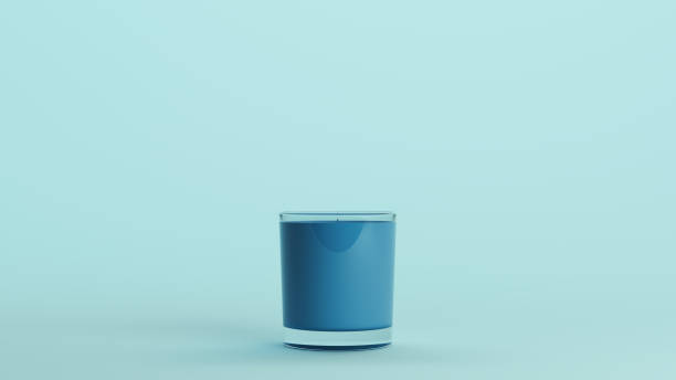 istock Candle wax wick glass jar holder container scented candle monochrome pale light blue background jar 2173908419