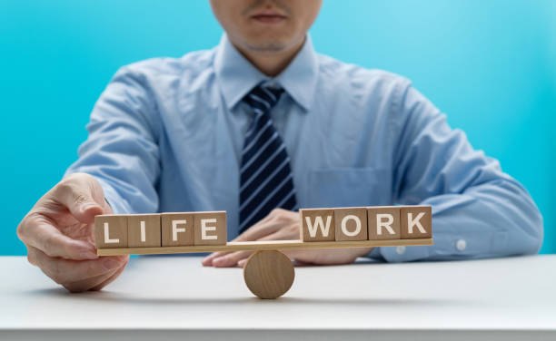 Wooden seesaw with word life and work