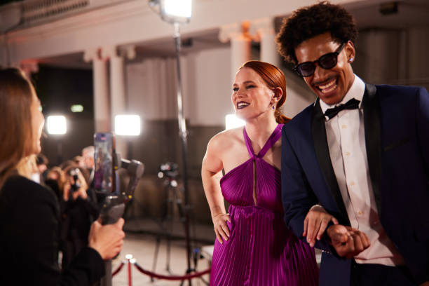 istock Streaming live from the red carpet, the influencer interviews leading actors. 2173911784