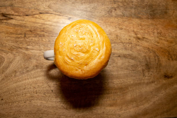 istock A delicious Chicken and Leek Mug Pot Pie, on a wooden kitchen table 2173912350
