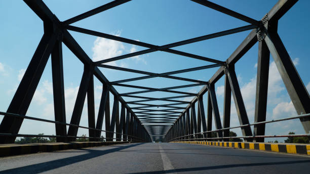 istock steel bridge with sky background 2173915166