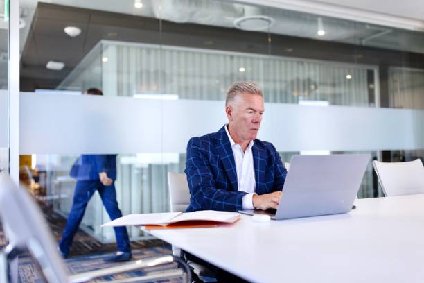 istock Businessman typing on his laptop in the office 2173915351