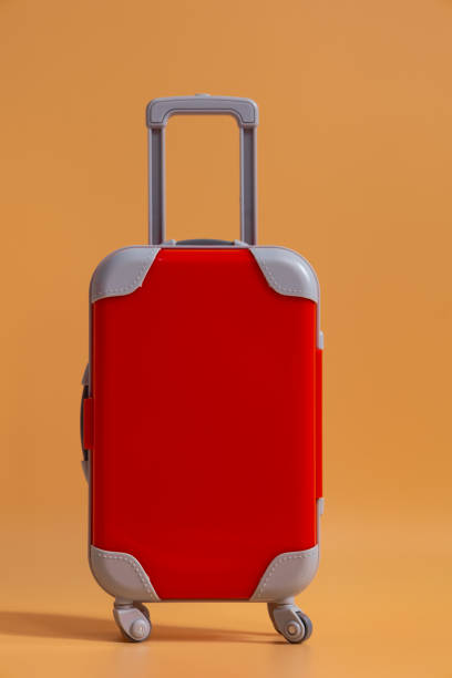 istock Vertical image of a red miniature travel suitcase 2173915823