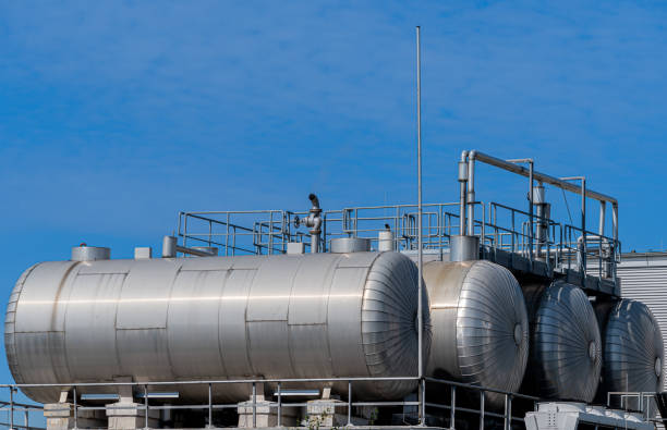 istock Gas tanks in a factory against clear sky 2173917607