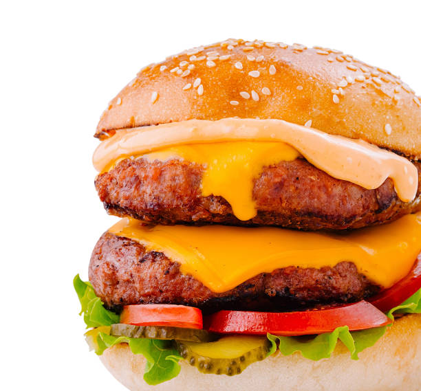 istock Delicious burger with melted cheese and vegetables on white background 2173921705