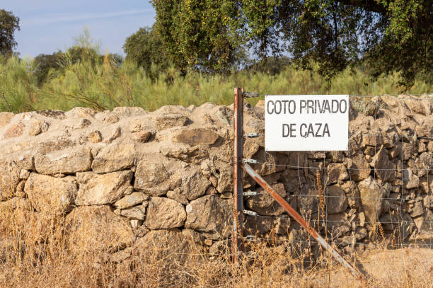 istock Restricted Access: Stone Wall and Sign for Private Hunting Reserve. 2173923589