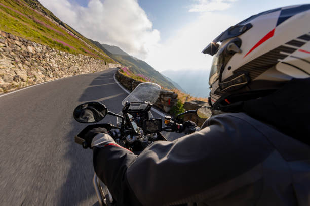 istock Motorbiker riding in Italian Alps 2173925147