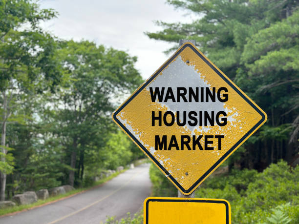 istock Warning Housing Market Sign 2173925456