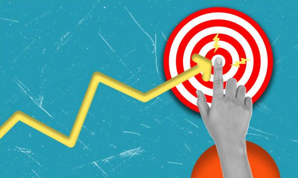 istock Modern art collage featuring a hand and finger touching a target on a blue background with the yellow arrow. 2173925681