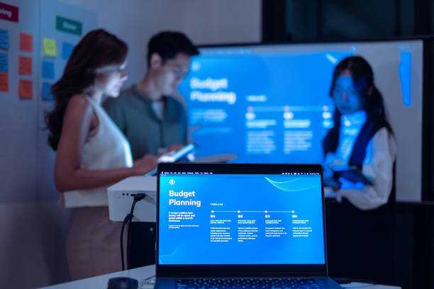istock team of financial discussion budget planning, analyzing digital financial data and strategy in a modern office at night 2173927891