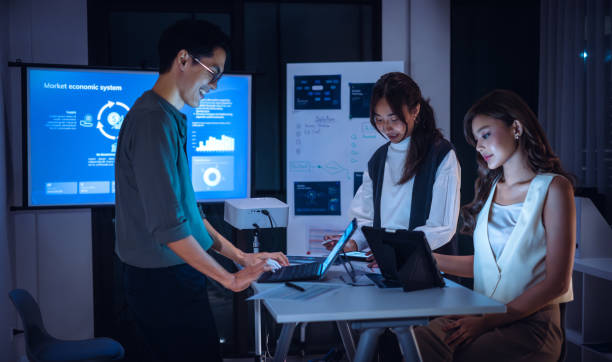 istock team of financial discussion budget planning, analyzing digital financial data and strategy in a modern office at night 2173928085