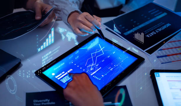istock close up hand team of financial discussion fintech  technology planning, analyzing digital financial data and strategy in a modern office at night 2173928135