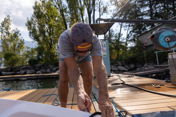 istock Man Docking a Boat on a Sunny Day 2173936555