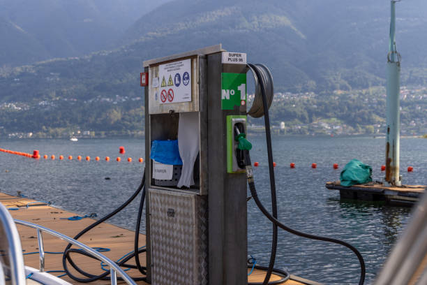 istock Boat Docked at Fuel Station on a Lake 2173936616