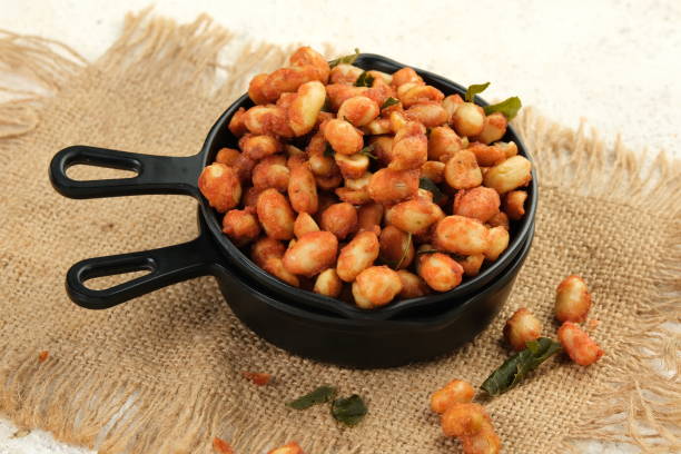 istock Spicy Flavored Peanut or Kacang Thailand in a Bowl on White Table Background. 2173945114