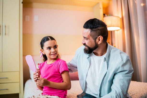istock Father and daughter talking at home 2173952685