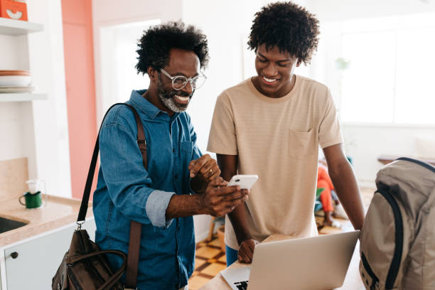 istock A happy father and son: Morning routine and technology 2173952779