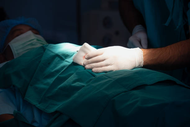 istock Professional doctors performing operation in surgery room 2173960100