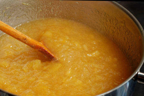 istock Boiled apples in cooking pot preparing preparing 2173960609