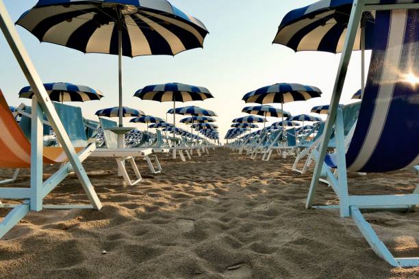 istock Rows of white and blue beach umbrellas in Rimini 2173961899
