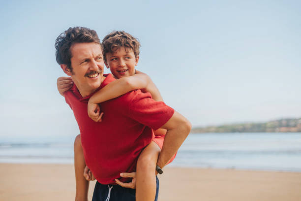 istock Portrait of father and son 2173962095