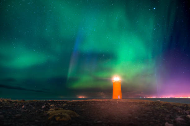 istock Lighthouse under Northern Lights at night 2173962389