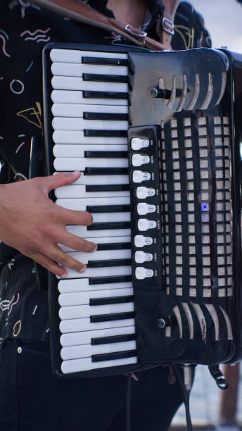 istock Hands playing the accordion 2173963897
