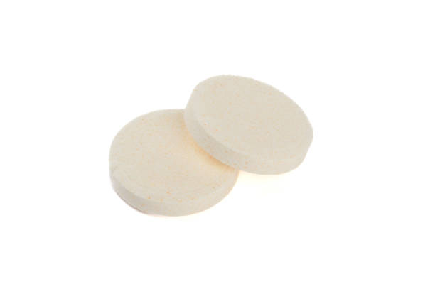 istock Close-up of two soluble vitamin C tablets on white background. 2173967984