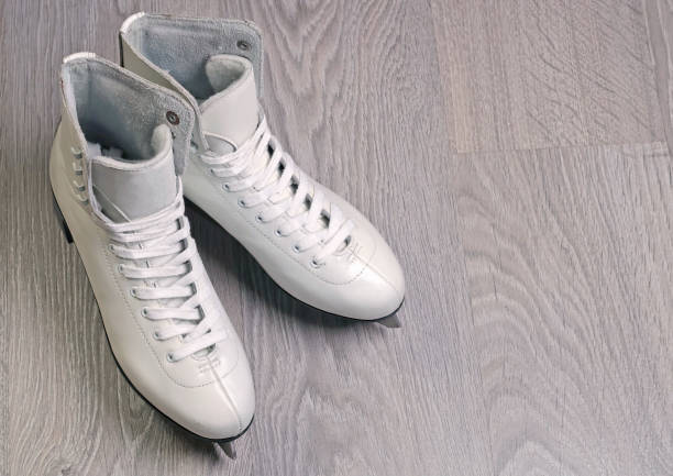 istock White old skates close-up. 2173971070