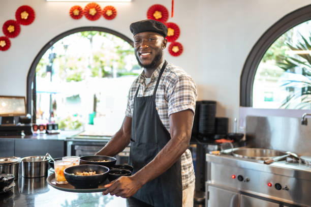 istock Energetic Chef Prepares Cuisine in Asian Eatery 2173972478