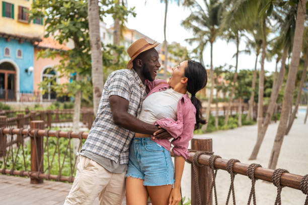 istock Joyful Multicultural Couple Enjoying Seaside Walk 2173972808