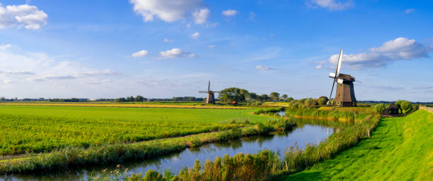 istock Dutch Windmill along a Canal near Schermerhorn, Netherlands 2173972978
