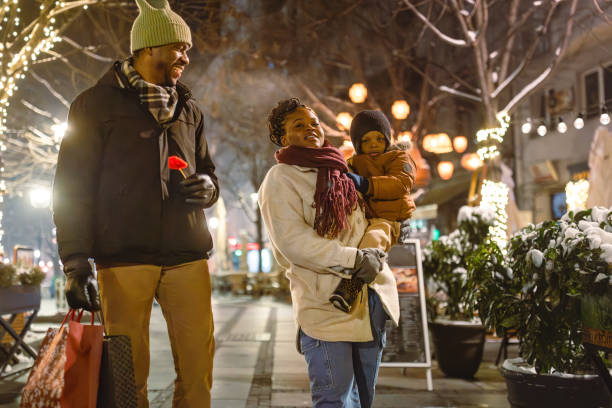 istock A Joyful Family Evening Stroll in Festive Lights 2173972999