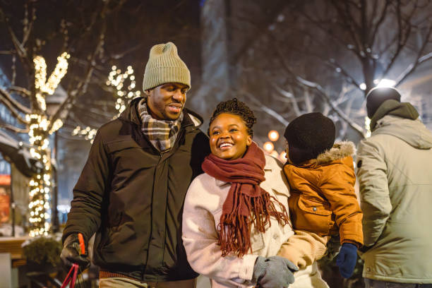 istock Family Enjoying Festive Evening Walk 2173973006