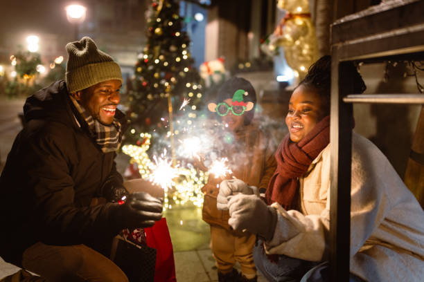 istock Holiday Celebration with Sparklers at Night 2173973080