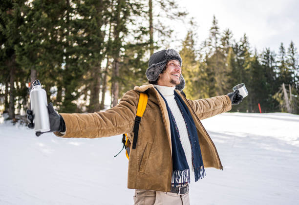 istock Happy man on a snowy mountain 2173975203