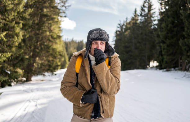 istock Young man is freezing on a cold winter 2173975735