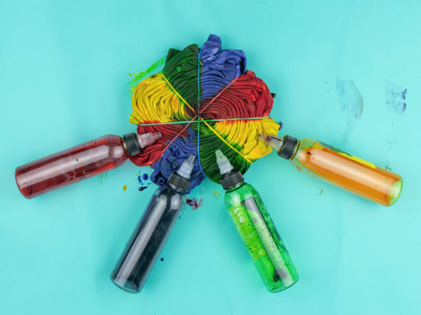 istock Colorful Tie-Dye Project with Paint Bottles on Aqua Background 2173977824